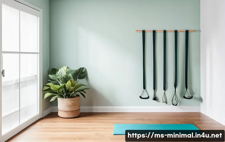 미니멀라이프 운동 기구 - A cozy small apartment workout corner featuring a neatly rolled yoga mat with a textured, non-slip s...
